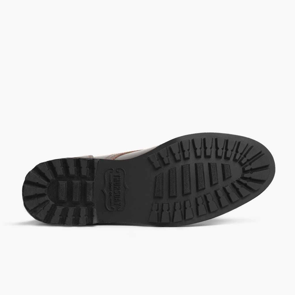 High-Traction Rubber Outsole & Lug Tread Pattern on Logger Waxed Cacao أحذية بوت جلدية رجالي