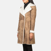 Close-Up Detail of Notch &amp; Leather Buttons Hardware on Women's Amie Distressed Brown Double Breasted Shearling Coat