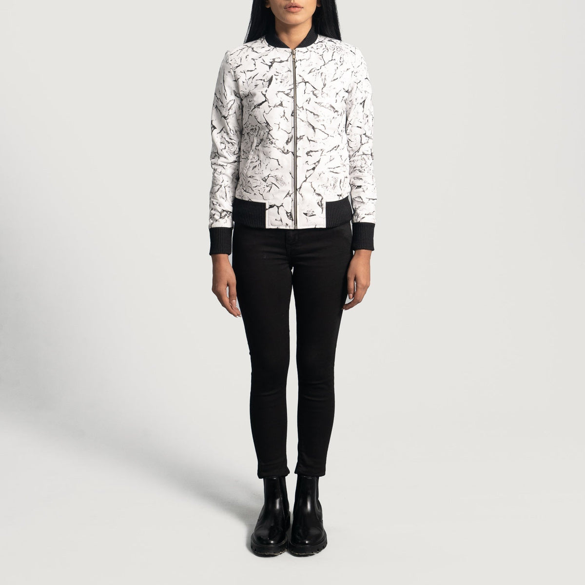 Close-Up Detail of Varsity &amp; Zipper Hardware on Women's Donna Blake White جاكيت بومبر جلد نسائي