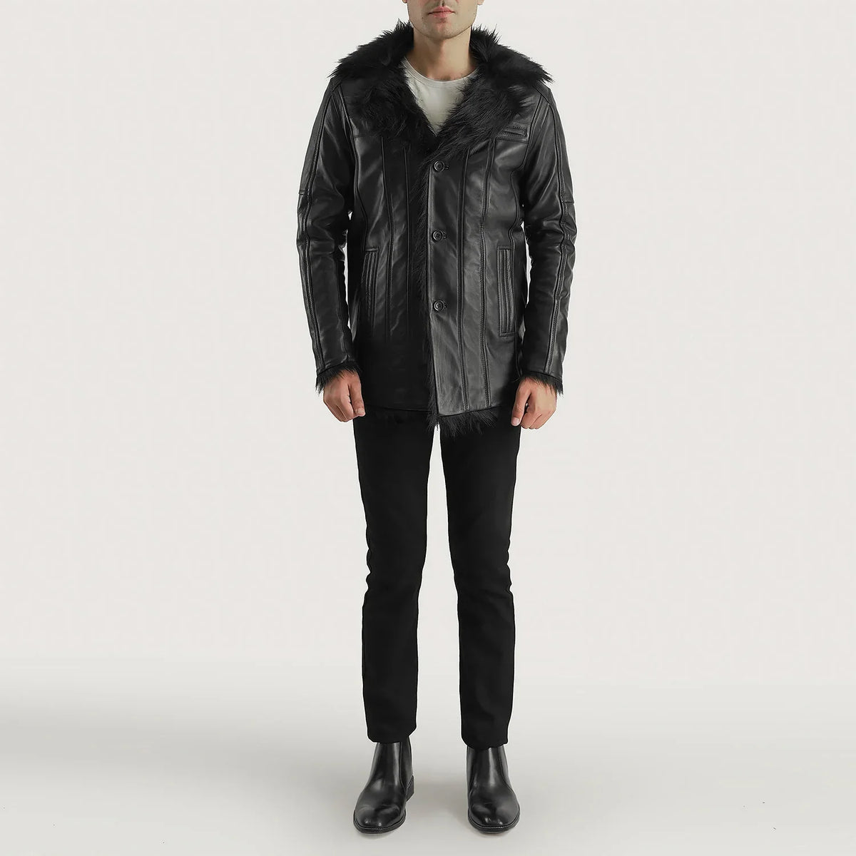 Close-Up Detail of Notch &amp; Button Hardware on Men's Furcliff Black Leather Coat