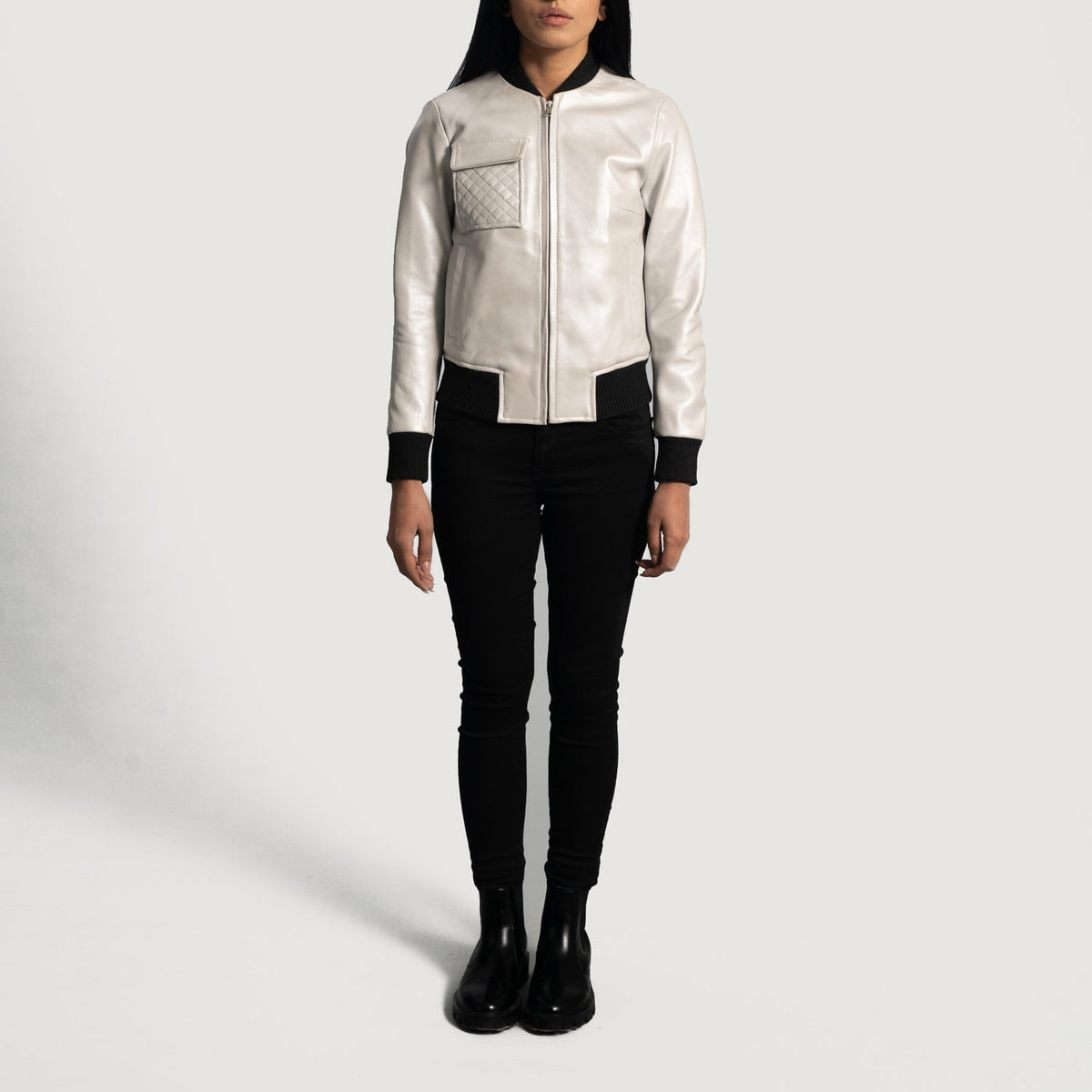 Close-Up Detail of Varsity &amp; Zipper Hardware on Women's Lana Silver جاكيت بومبر جلد نسائي