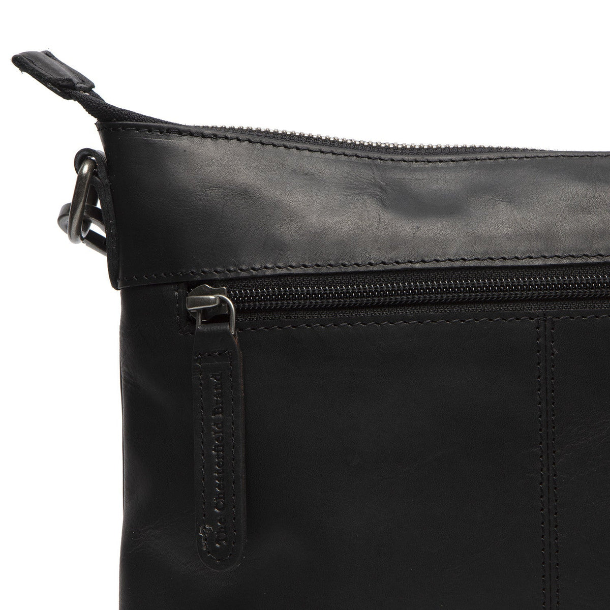 
Solid Antique Brass Hardware & Heavy-Duty Dual Zipper Detail on Faro حقيبة كروس جلدية