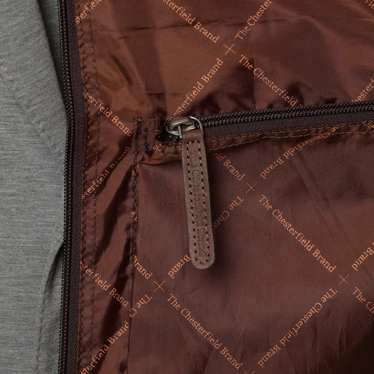 Styled Fit Perspective of Leather Garment Bag Josh نسائي on Model - Natural Daylight Drape