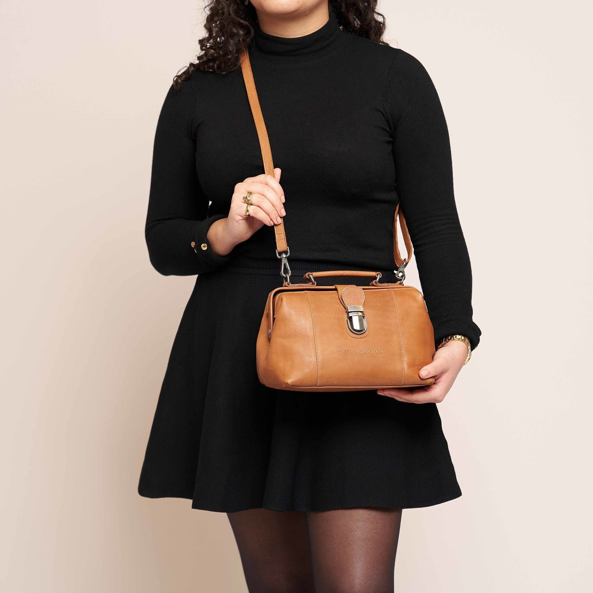 Styled Fit Perspective of Rachael Full-Grain Leather Handbag نسائي on Model - Natural Daylight Drape