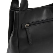Close-Up Detail of Classic Collar &amp; Heavy-Duty Zipper Hardware on Tenara Full-Grain Leather Handbag نسائي