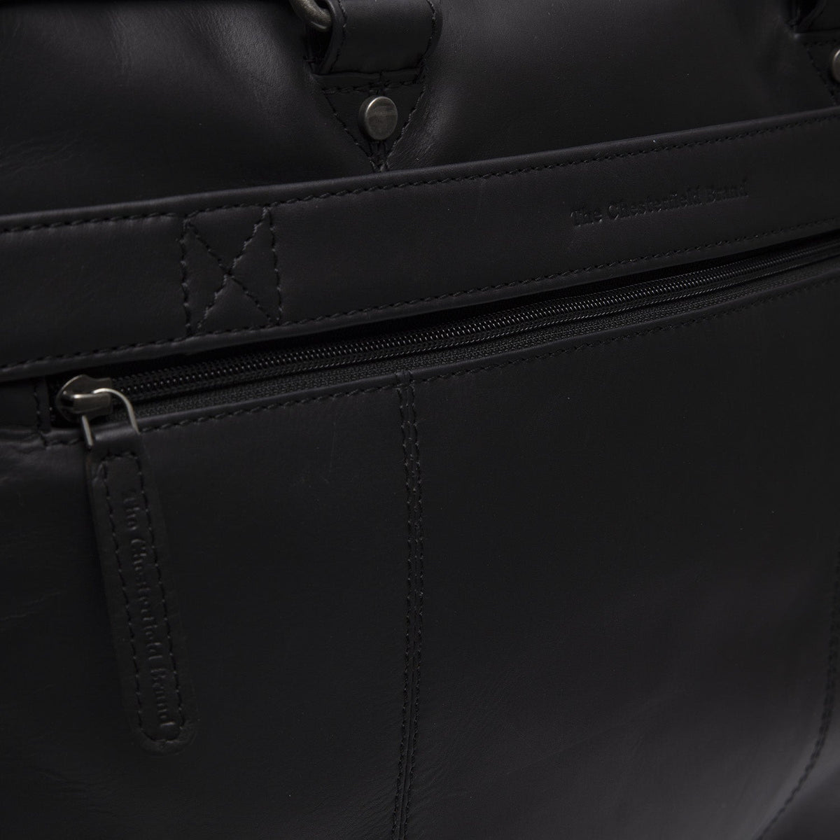 
Reinforced Leather Base with Protective Metal Studs Detail