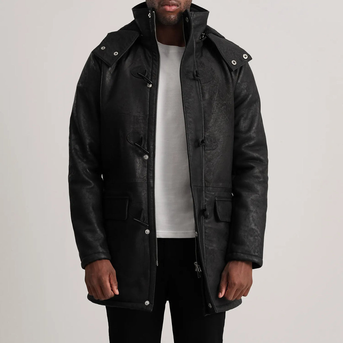 Nolan Black Snuffed Leather Duffle Coat in Distressed Black Sheepskin Snuffed - Front Profile View &amp; Tailored Silhouette | Buy Online