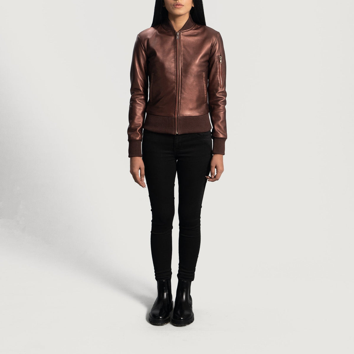 Close-Up Detail of Varsity &amp; Zipper Hardware on Women's Reida عنابي جاكيت بومبر جلد نسائي