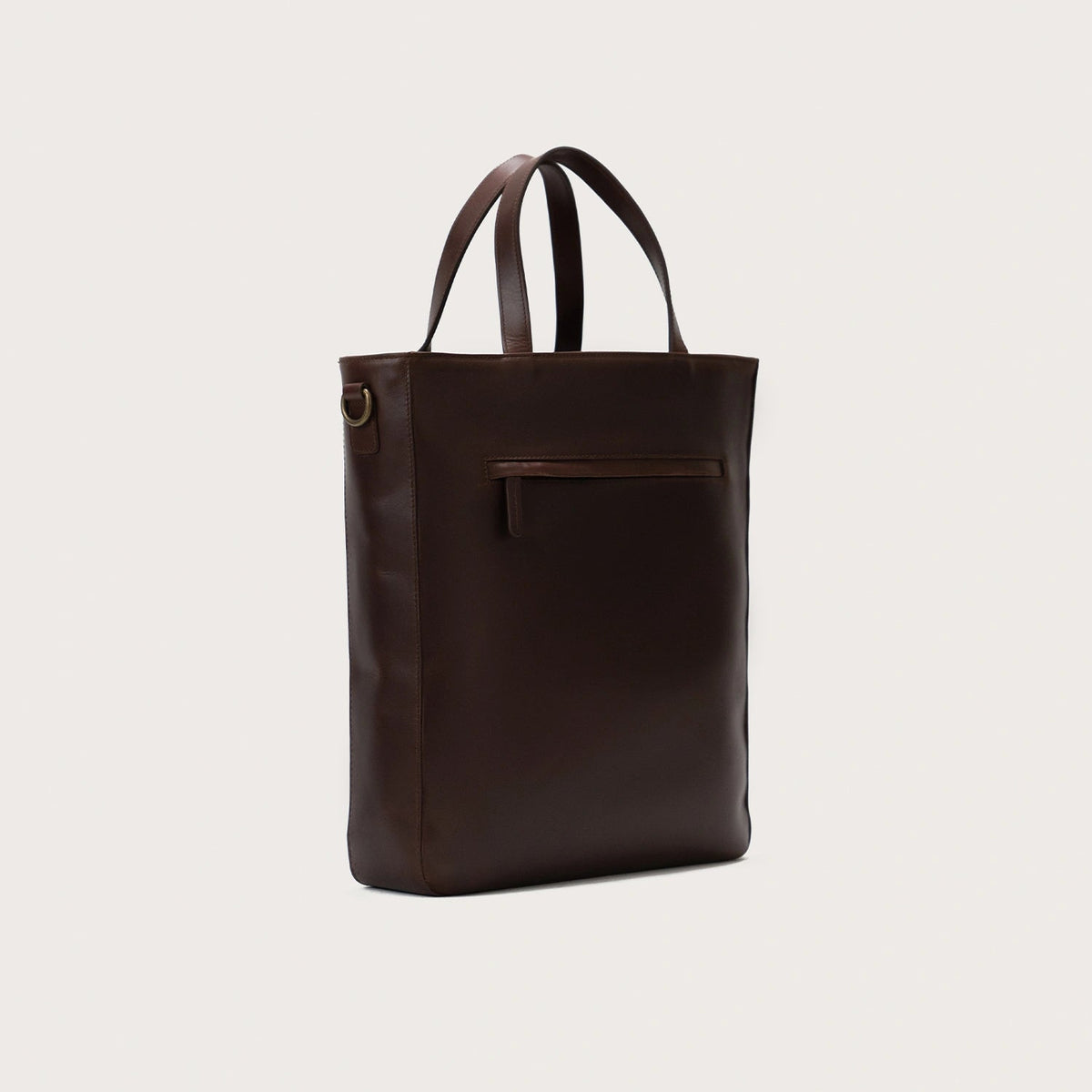 
The Poet Vintage Brown Leather Tote Bag For Men & Women - عرض جانبي يوضح عمق الحقيبة وسعة التخزين